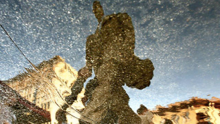 Illustration for article titled These Photos Were Amazingly Taken from Street Puddles